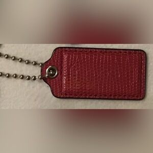 Coach bag charm made of lizard-embossed leather w Silver ball chain